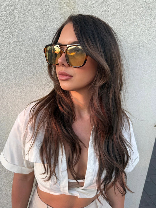 Rich brunette with warm ribbons through the lengths at SEB DID THIS HAIR in Stepney, Adelaide